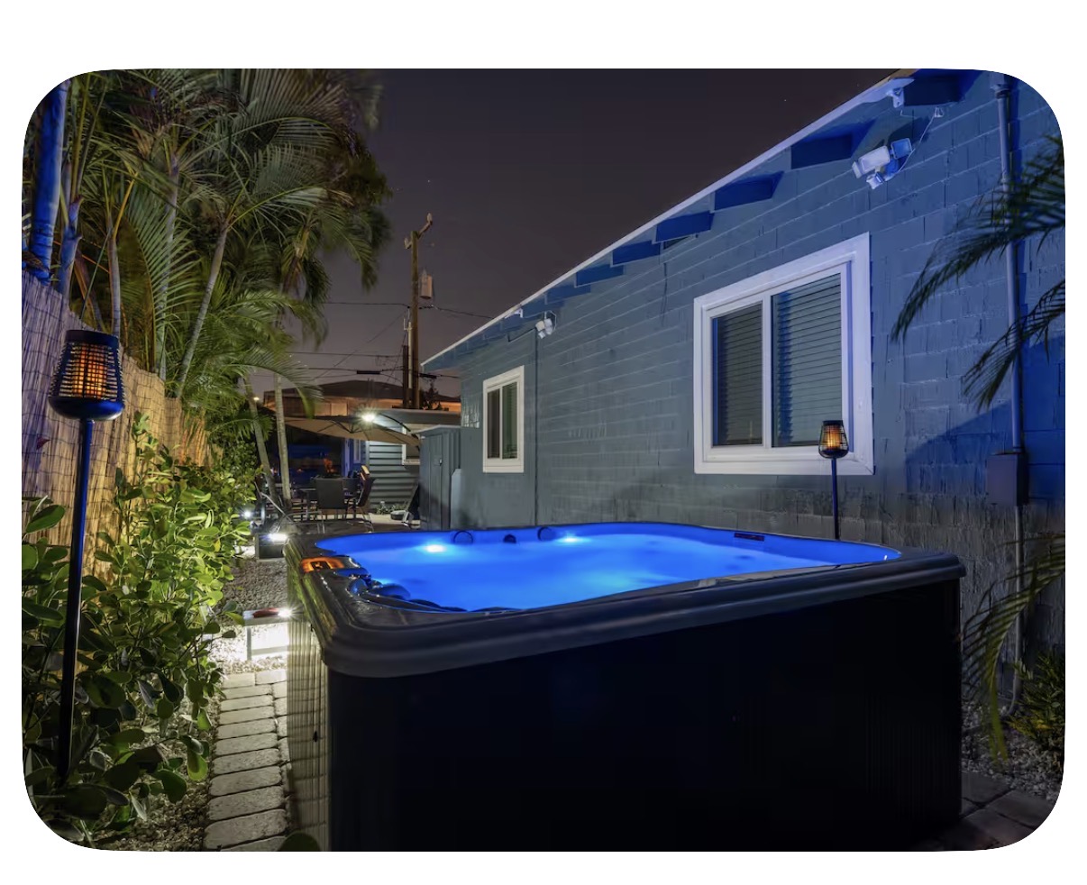 Illuminated hot tub at night