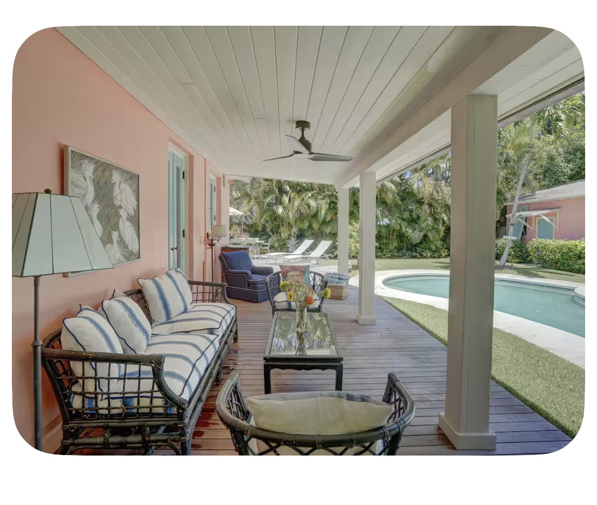 Covered patio beside a vacation rental pool